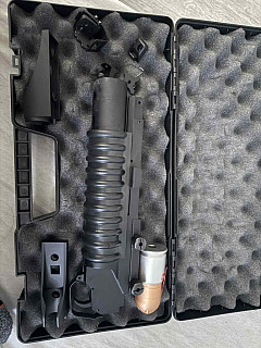 m203