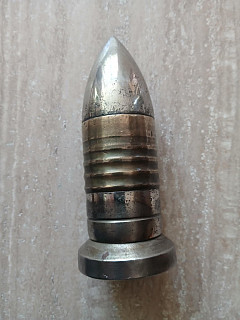 Těžítko RU , dělostřelecký granát