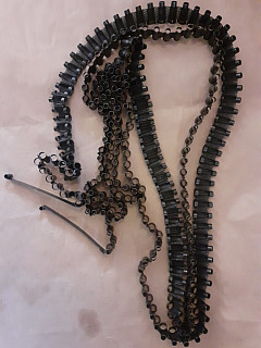 Střelivý pás 7,62 mm x 54. 250 článků.