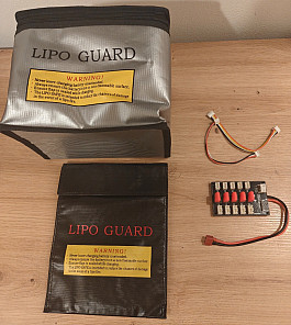 2x nehořlavý vak + multi nabíječ * BB6