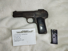 znehodnocená pistole FN 1900