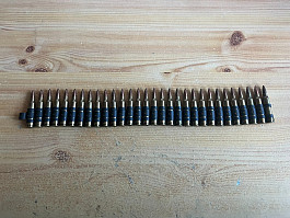 5.56 nábojový pás delaborovaný