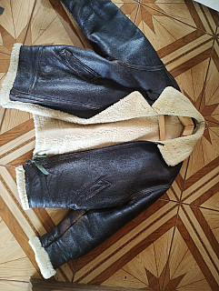 US letecká bunda a čepice s beránkem 