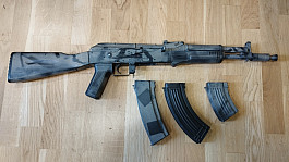 AK-105