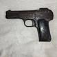 znehodnocená pistole FN 1900
